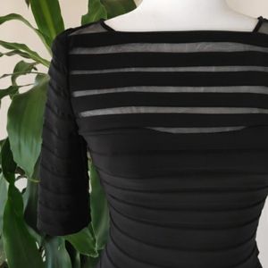 Sexy body hugging black dress by Adrianna Papell s